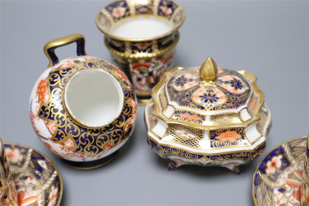 A Royal Crown Derby part tea service, pattern no. 2451, a similar vase and a sugar scuttle (faults)